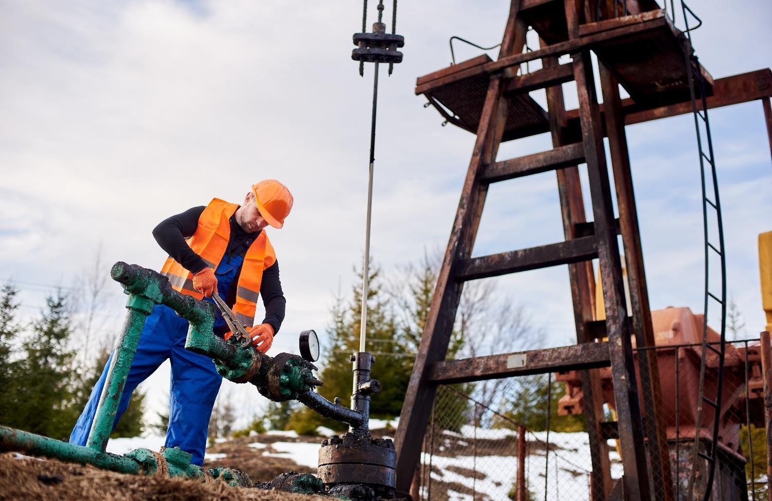 Oilfield professional working with drilling equipment